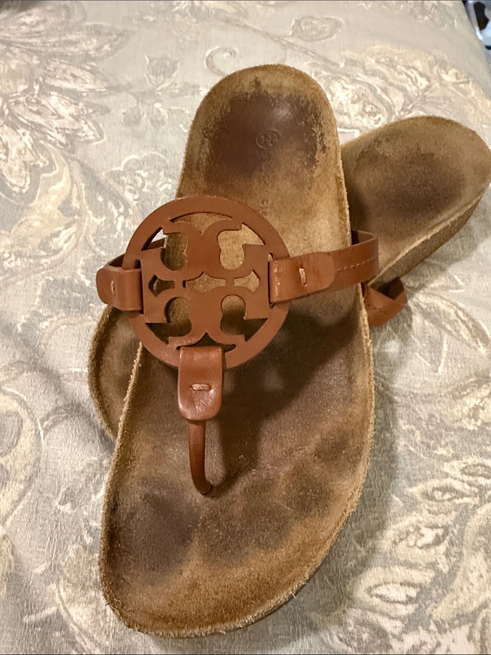 Tory Burch Brown Leather Thong Sandals with Decorative Medallion